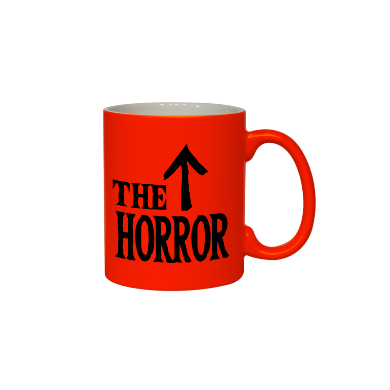 Neonowy pomarańczowy kubek z napisem horror i strzałką